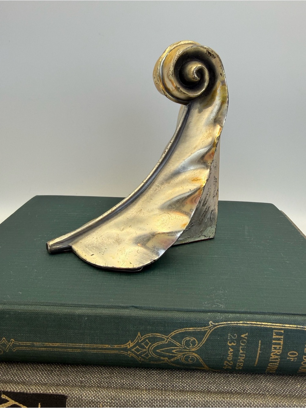 Vintage Scrolled Feather Silver Toned Bookend with Patina